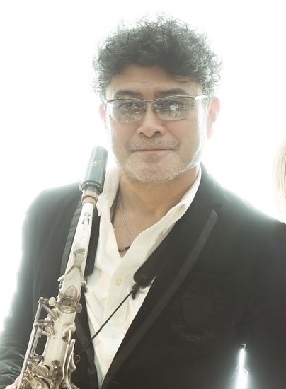 野々田万照